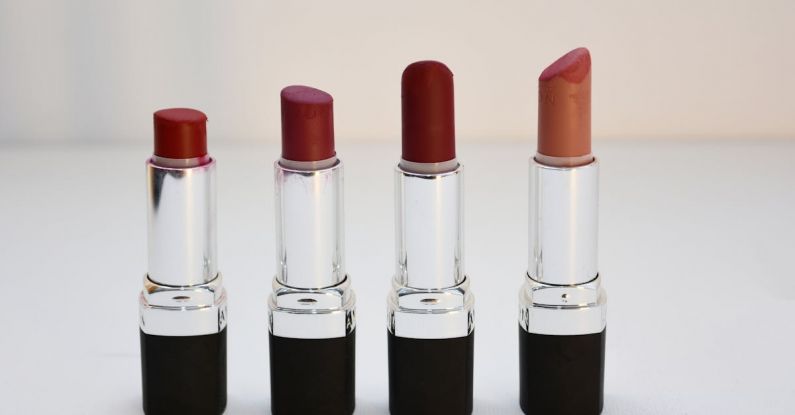 Lipsticks - Four Aligned Assorted-color Lipsticks
